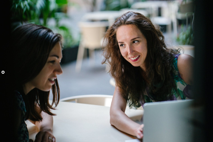 two people meeting in a cafe